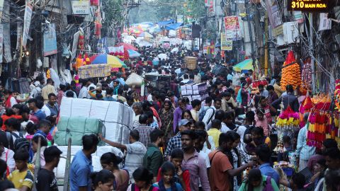 People shop at a market ahead of Diwali, the Hindu festival of lights, in Delhi's old quarters in October. 