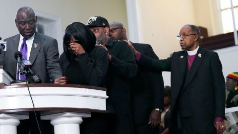 The mother of Tyre Nichols cries as she is comforted by Nichols' stepfather at a news conference in Memphis Monday. 