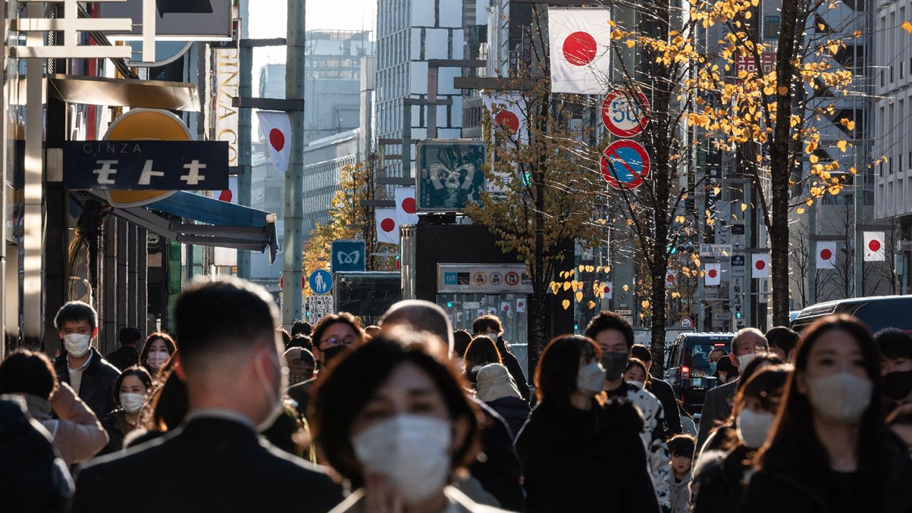 Japanese flags on a street in Ginza, Tokyo on December 29, 2022.