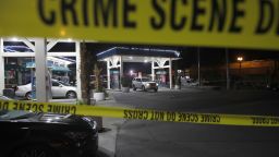 Oakland police investigate a multiple shooting and homicide at the Valero gas station on Seminary Avenue at MacArthur Boulevard in Oakland, Calif., on Monday, Jan. 23, 2023. (Jane Tyska/Bay Area News Group via AP)