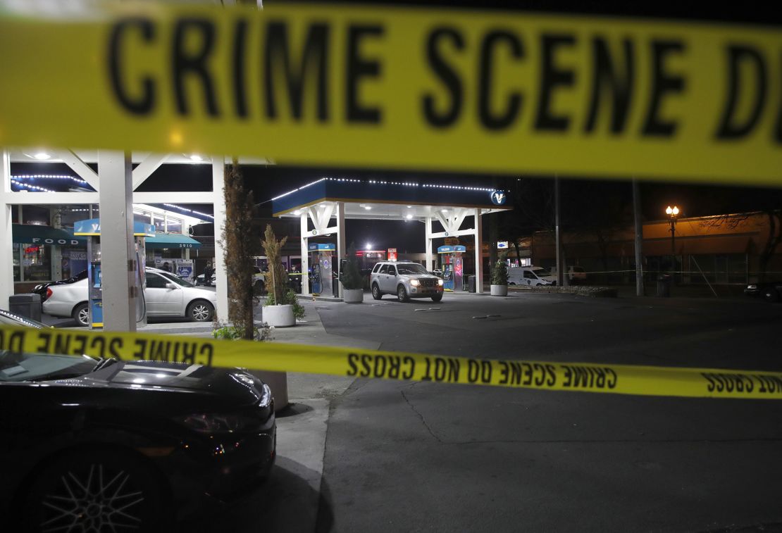 Crime scene tape marks the area of a shooting in Oakland, California, Monday.