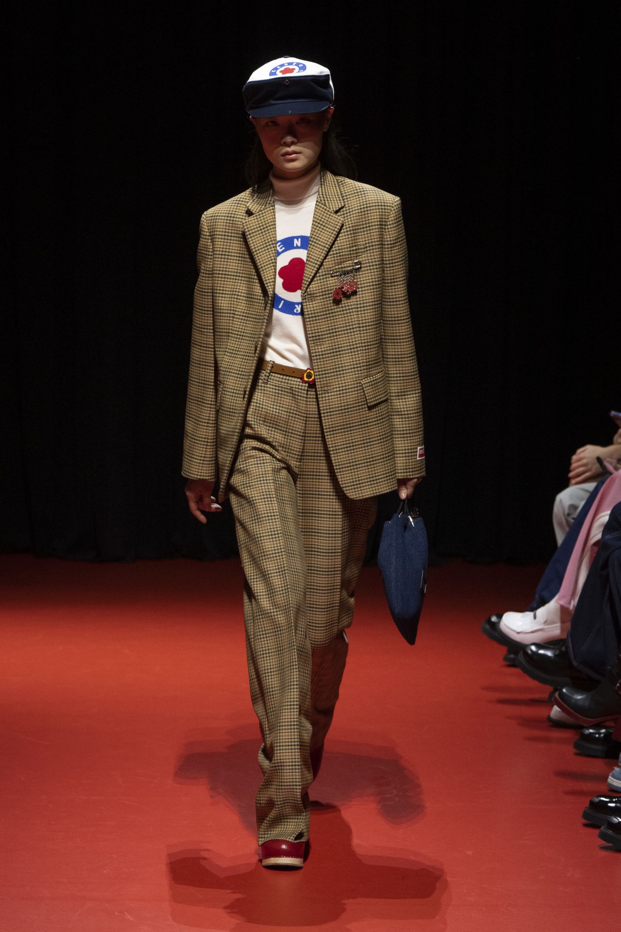 Nigo's third collection for Kenzo was inspired by The Beatles, and scored by covers of the bands most famous songs.