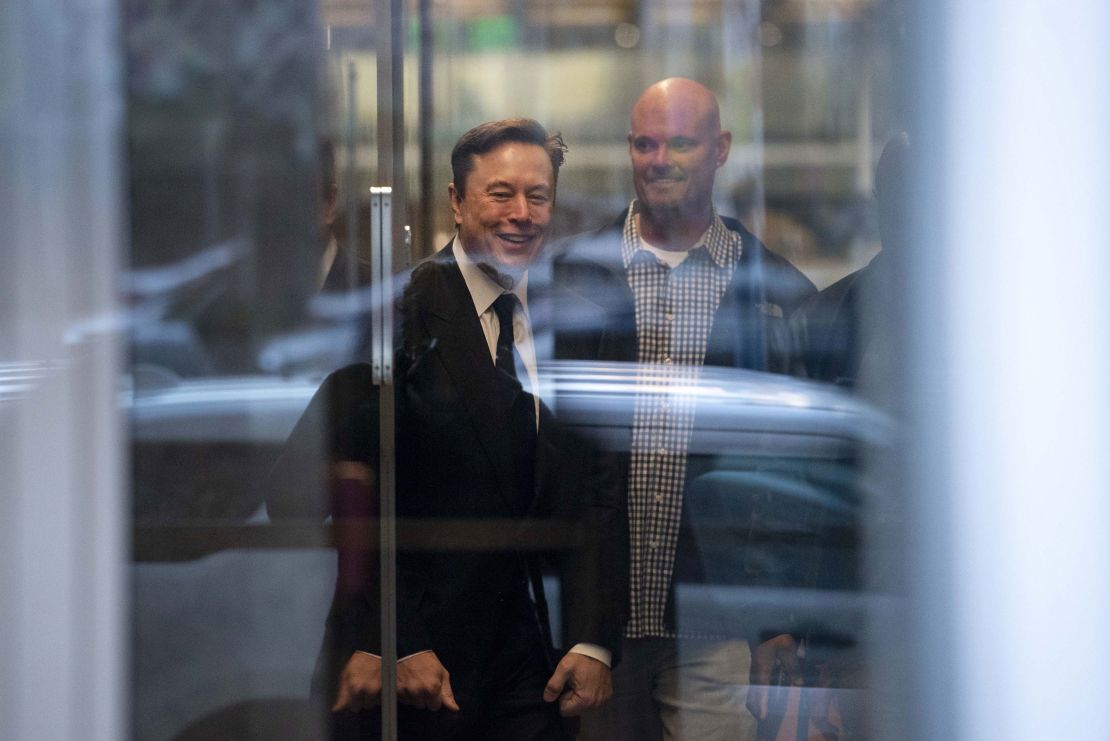 Elon Musk, chief executive officer of Tesla Inc., left, arrives at court in San Francisco, California, US, on Tuesday, Jan. 24, 2023. Investors suing Tesla and Musk argue that his August 2018 tweets about taking Tesla private with funding secured were indisputably false and cost them billions of dollars by spurring wild swings in Tesla's stock price. 