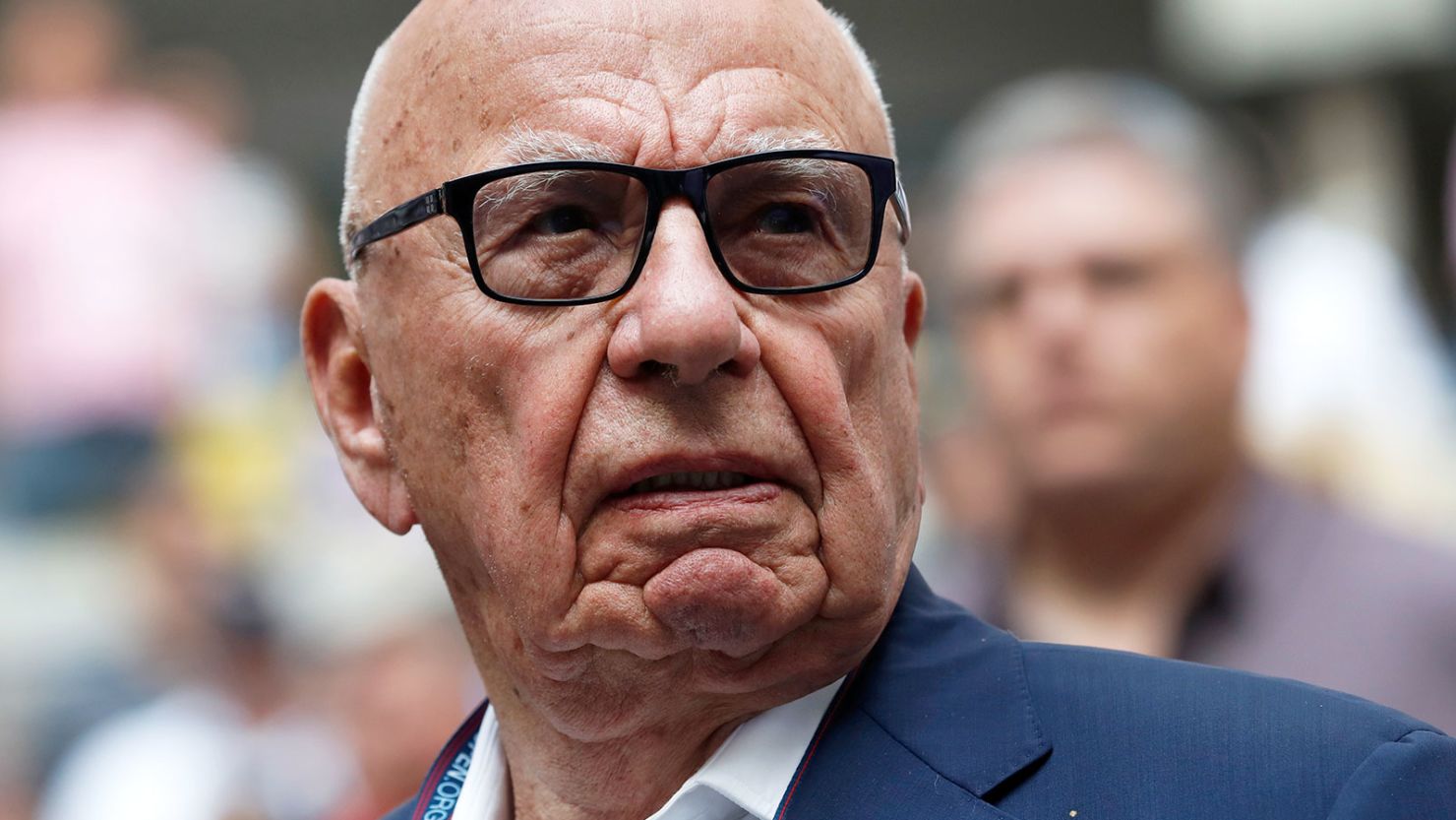 Rupert Murdoch, Chairman of Fox News Channel, stands before Rafael Nadal of Spain plays against Kevin Anderson of South Africa. 