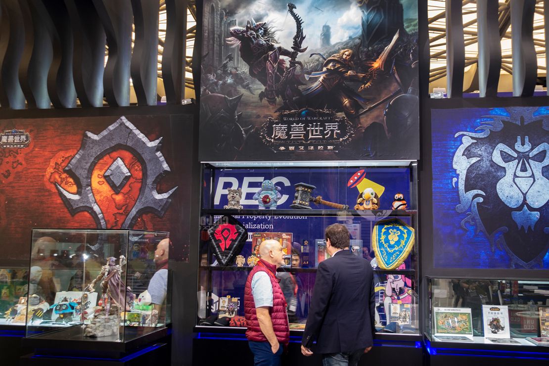 People visiting a Blizzard Entertainment 'World of Warcraft' stand during an expo in Shanghai in October 2018.