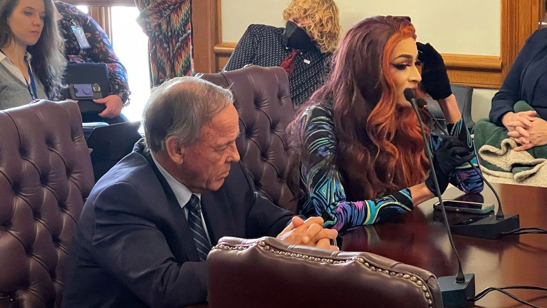 Drag performer MD Hunter, whose stage name is Athena Sinclair, testifies before a state Senate panel as state Sen. Gary Stubblefield, left, listens, at the Arkansas Capitol in Little Rock, Arkansas, on Thursday, January 19, 2023.  