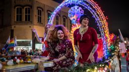 Drag queens Felicia Enspire, Alexandria Van Cartier and Sedonya Face sit on a float at a Christmas parade on Saturday, Dec 3 in Taylor, TX.