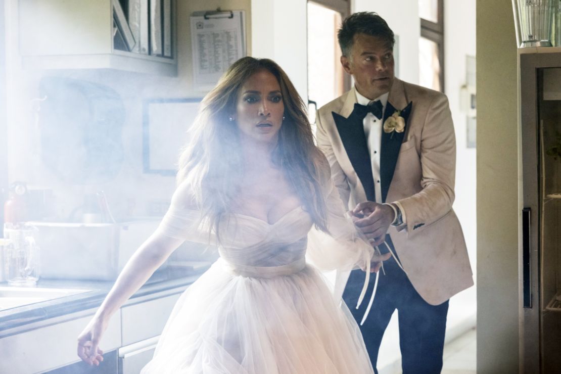From left: Jennifer Lopez and Josh Duhamel in a scene from "Shotgun Wedding." 