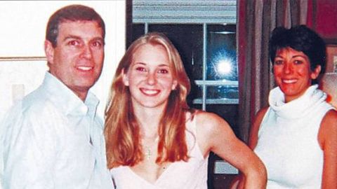 A photograph appearing to show Prince Andrew with Jeffrey Epstein's accuser, Virginia Roberts Giuffre, and, in the background, Ghislaine Maxwell