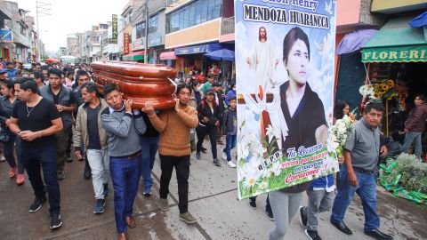 Relatives and friends attend the funeral service of Jhon Henry Mendoza Huarancca, who was killed during protests following the ouster of former Peruvian President Pedro Castillo, in Ayacucho, Peru, on December 17, 2022.