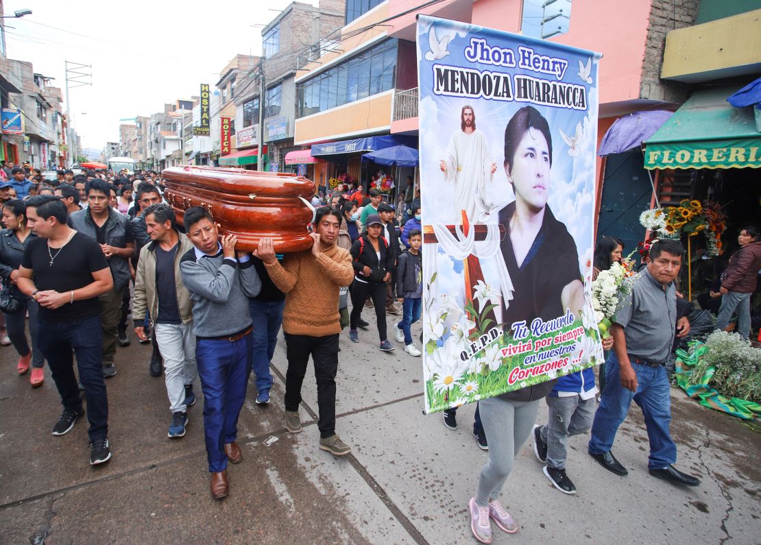 Relatives and friends attend the funeral service of Jhon Henry Mendoza Huarancca, who was killed during protests following the ouster of former Peruvian President Pedro Castillo, in Ayacucho, Peru, on December 17, 2022.