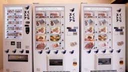 A canned meat machine along with two frozen sashimi and cooked meat machines are displayed inside a vending machine shop, opened by a Japanese whale-hunting company, in Yokohama, Japan, January 24, 2023.