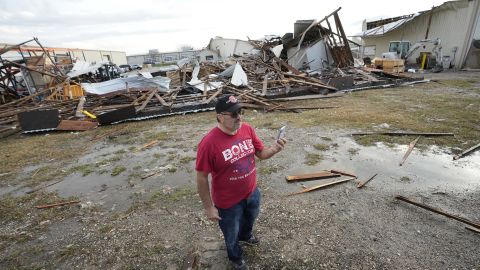John Liparito surveys storm damage Tuesday in Pasadena, Texas. 