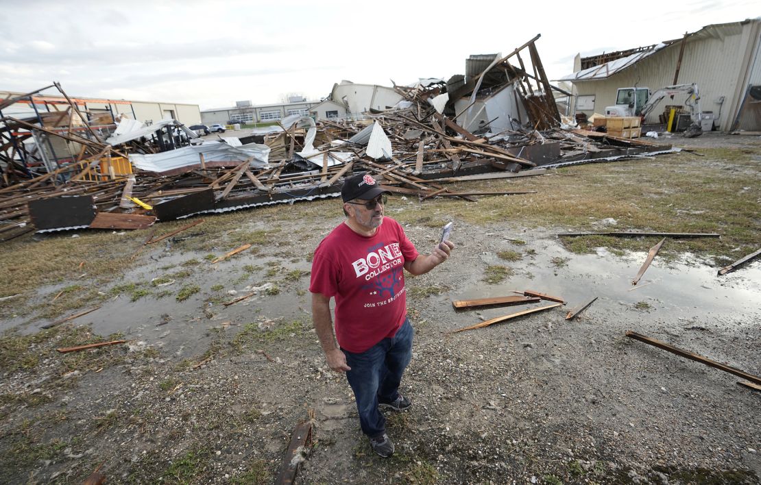 John Liparito surveys storm damage Tuesday in Pasadena, Texas. 