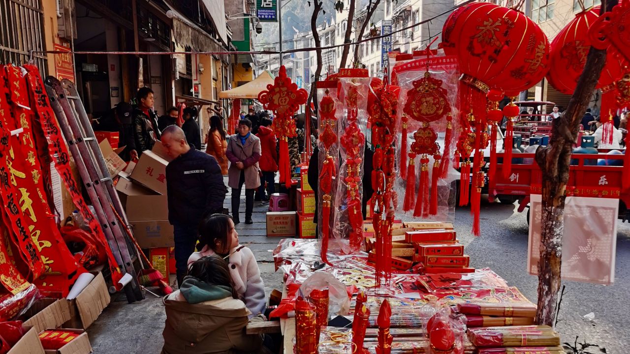 A marketplace selling Lunar New Year decorations in Liping county, Guizhou province, China.