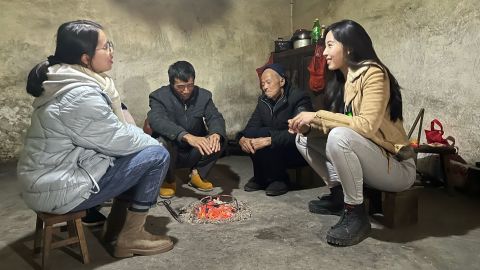 Xiao Qing speaks to CNN in her home in Dali Village.