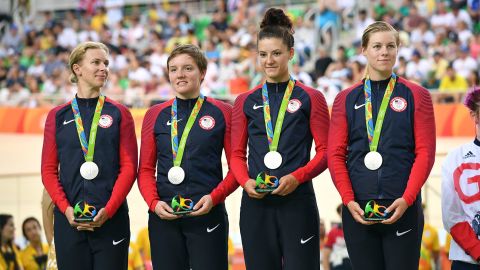 Kelly, with her team and silver medal, representing USA in the Womens Team Pursuit at the Rio Olympics. 