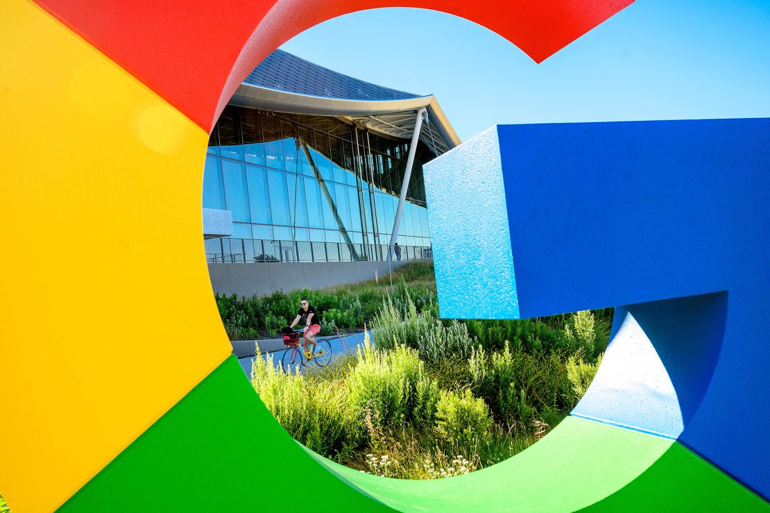 A bicyclist rides along a path at Google's Bay View campus in Mountain View, California on June 27, 2022. 