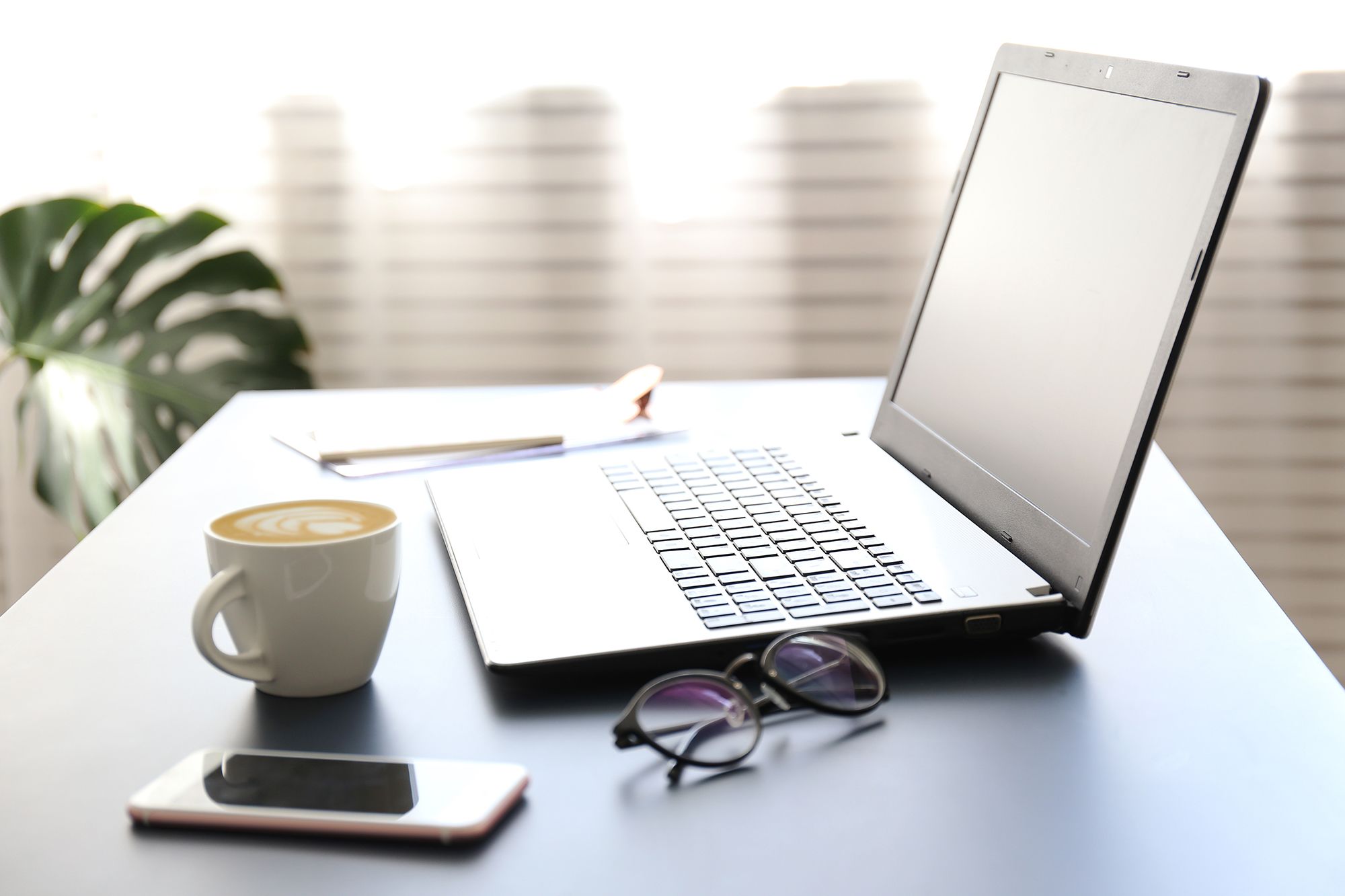 https://media.cnn.com/api/v1/images/stellar/prod/230125160659-laptop-empty-desk-stock.jpg?c=original