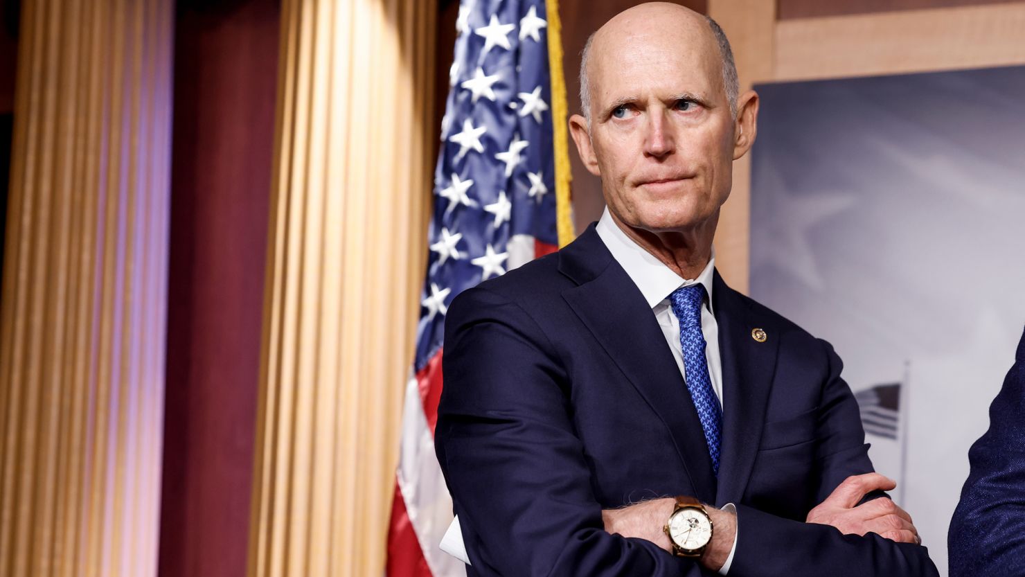 Sen. Rick Scott listens during a news conference at the Capitol Building on January 25 in Washington.