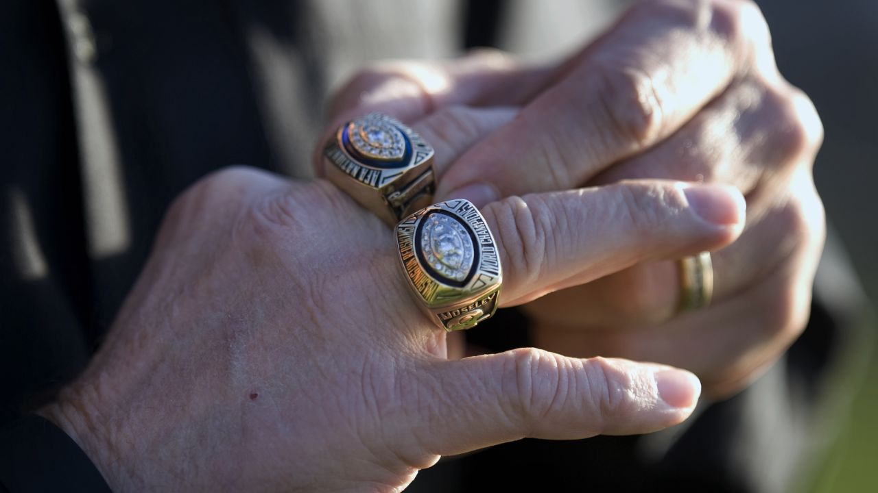 The hand of Moseley, displaying the two championship rings of his life: Super Bowl XVII (lower) and one for being part of the Fredericksburg Generals.