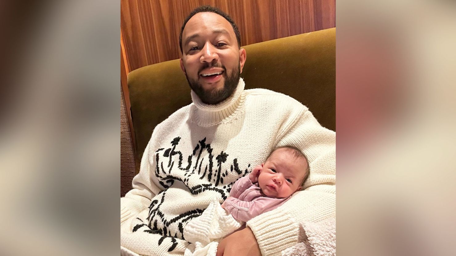John Legend shares a photo with his new baby. 