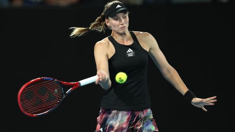 MELBOURNE, AUSTRALIA - JANUARY 26: Elena Rybakina of Kazakhstan plays a forehand in the Semifinals singles match against Victoria Azarenka during day 11 of the 2023 Australian Open at Melbourne Park on January 26, 2023 in Melbourne, Australia. (Photo by Clive Brunskill/Getty Images)