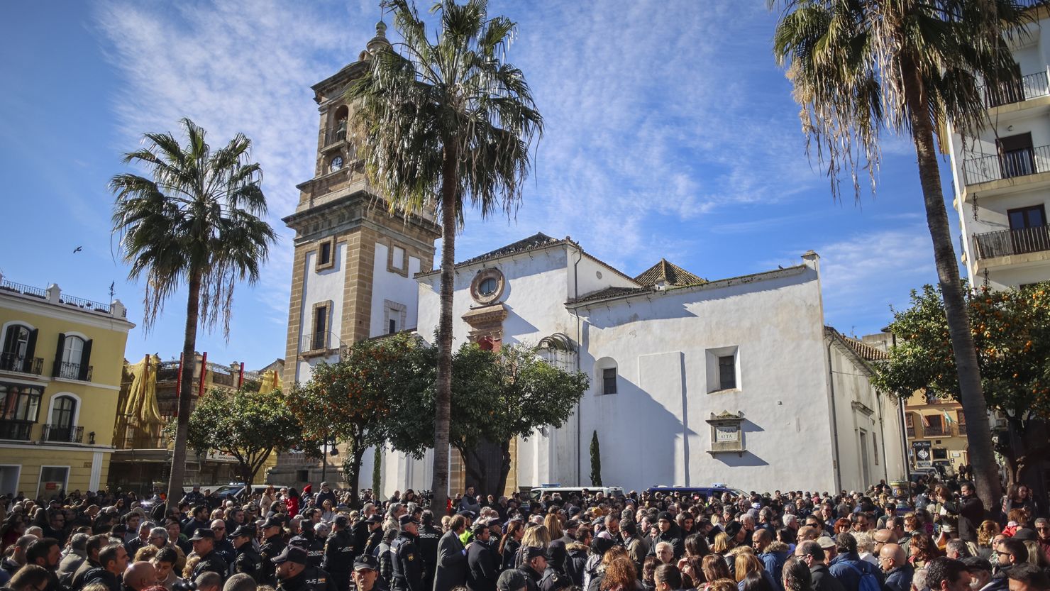 Locals gather on January 26, 2023 to remember a sacristan who was killed Wednesday during a deadly machete attack at two churches in Algeciras in southern Spain.