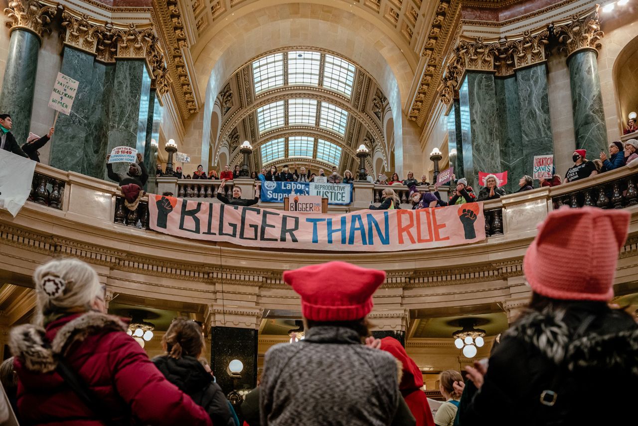Demonstrators gather for a "Bigger Than Roe" rally inside the Wisconsin State Capitol after participating in a women's march for abortion rights on Sunday, January 22.
