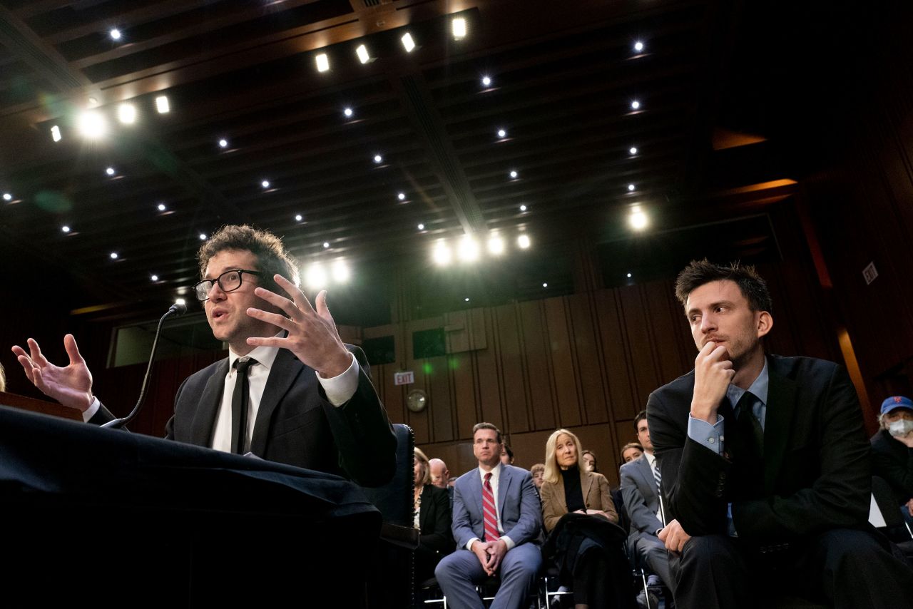 Jordan Cohen, right, listens as his Lawrence bandmate Clyde Lawrence testifies before the Senate Judiciary Committee in Washington, DC, on Tuesday, January 24. Lawrence was just one of the witnesses in Tuesday's <a href=