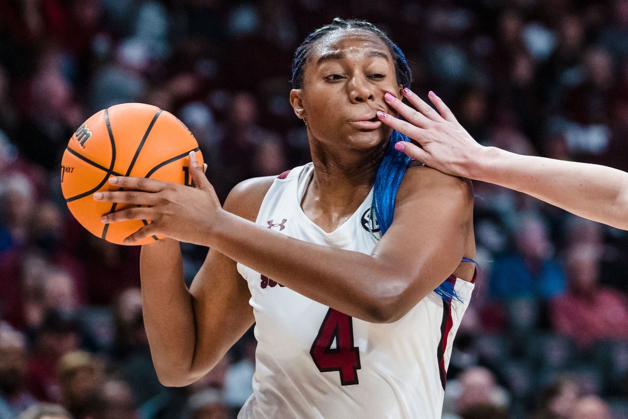 South Carolina star Aliyah Boston is hit in the face by an Arkansas defender during a college basketball game in Columbia, South Carolina, on Sunday, January 22.