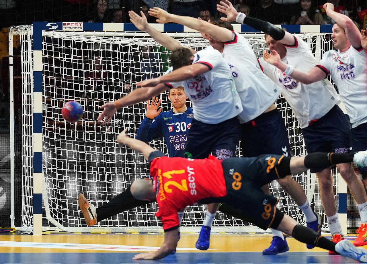 Norwegian handball player Torbjørn Bergerud looks to stop a Spanish player's shot during the quarterfinals of the Handball World Championship on Wednesday, January 25.