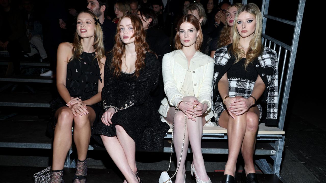 From left to right, Angèle, Sadie Sink, Lucy Boynton, and Apple Martin attend the Chanel Haute Couture Spring-Summer 2023 show in Paris.