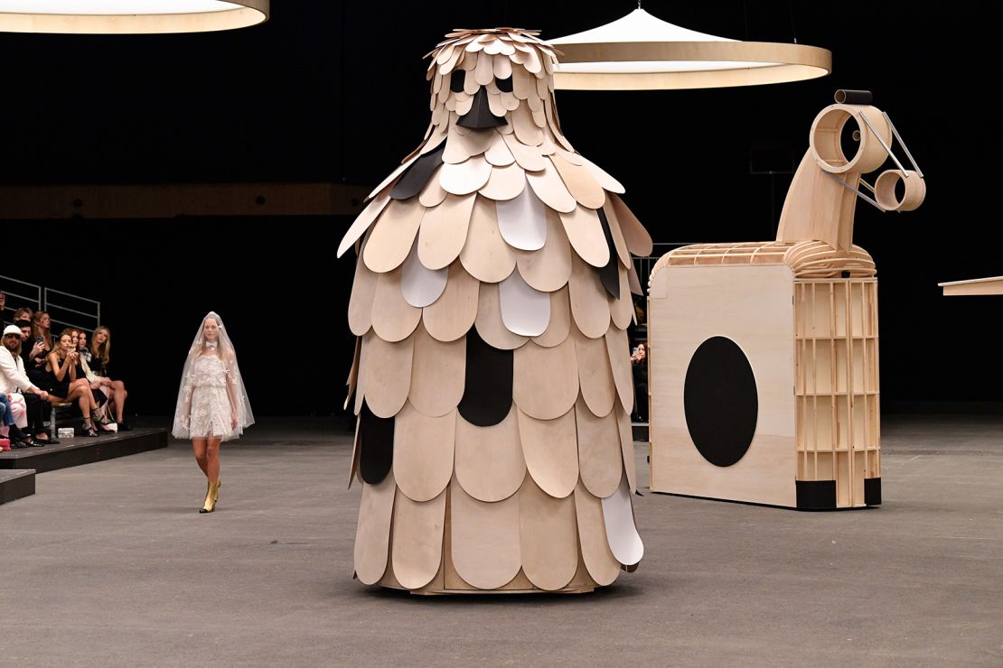 Giant mobile cardboard animals filled the runway at the Chanel show.