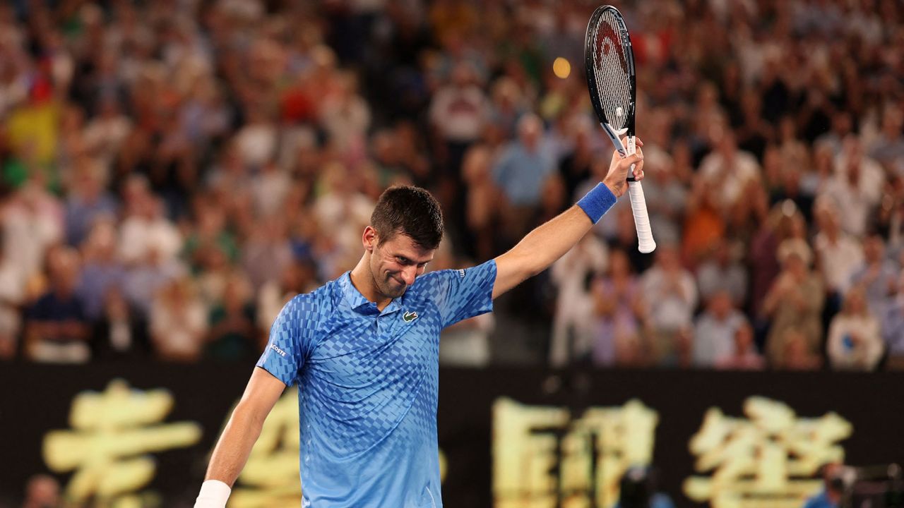 Djokovic celebrates winning his semifinal match against Paul.