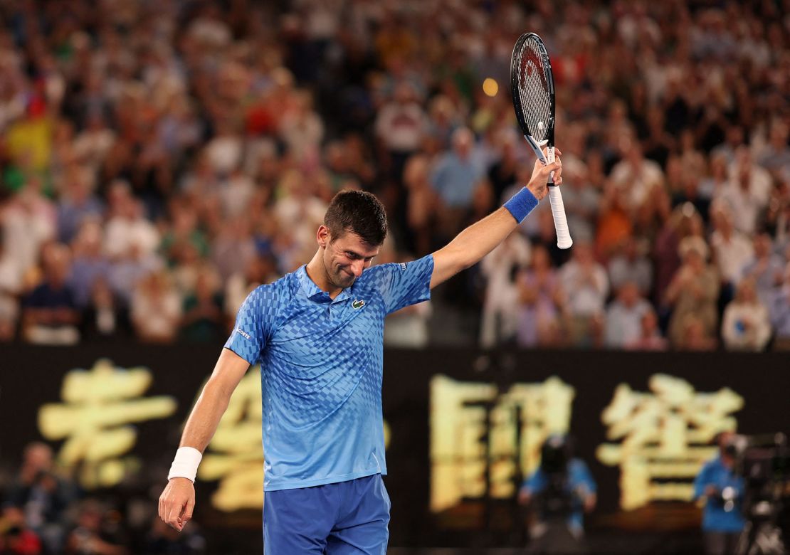 Djokovic celebrates winning his semifinal match against Paul.