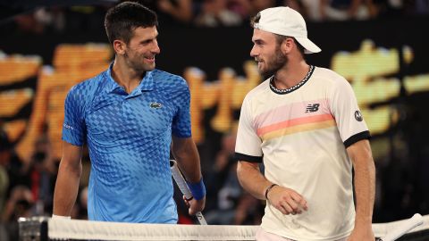 Djokovic and Paul chat at the net during their semi-final match at the Australian Open.