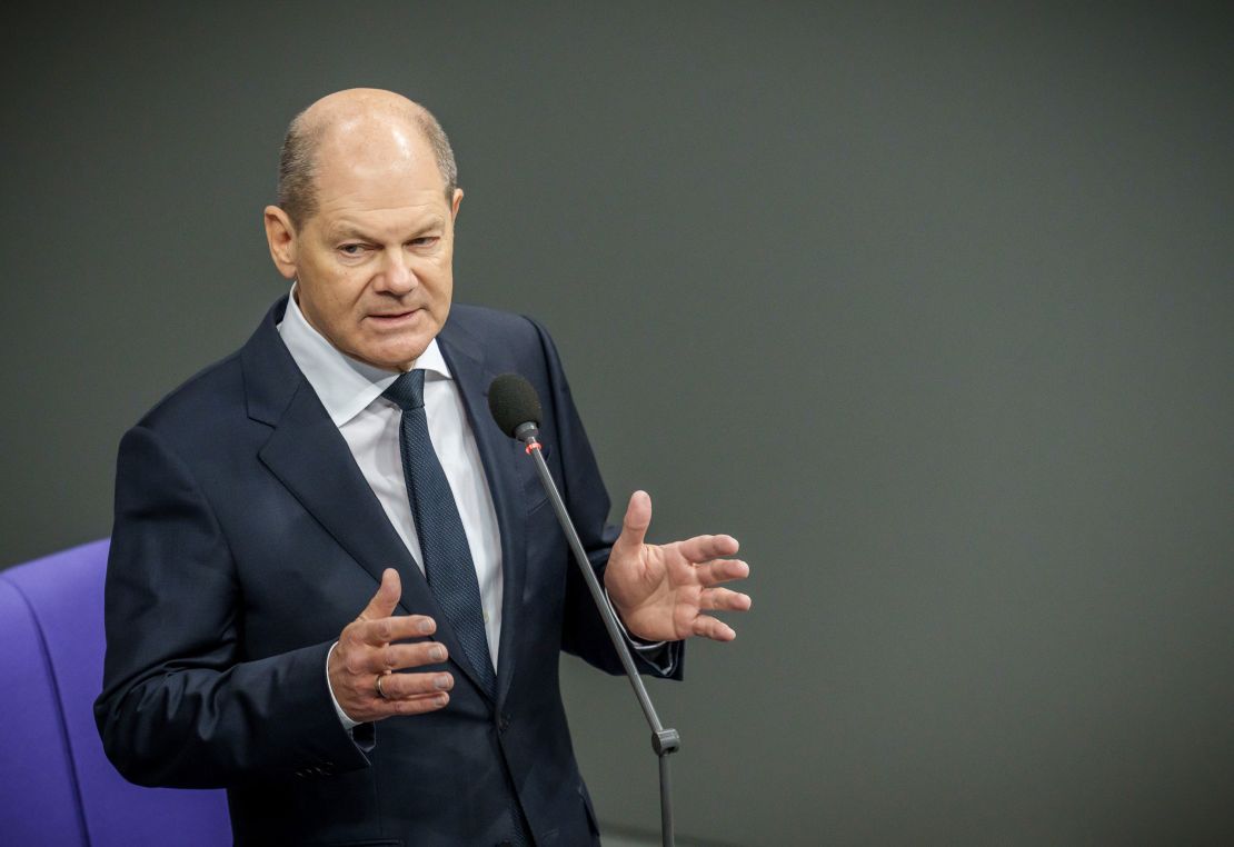 Chancellor Olaf Scholz speaks in Germany's Bundestag after announcing that his government would deliver Leopard battle tanks to Ukraine. 