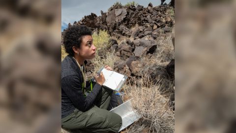 Watkins takes notes during geology training in Arizona in 2019.