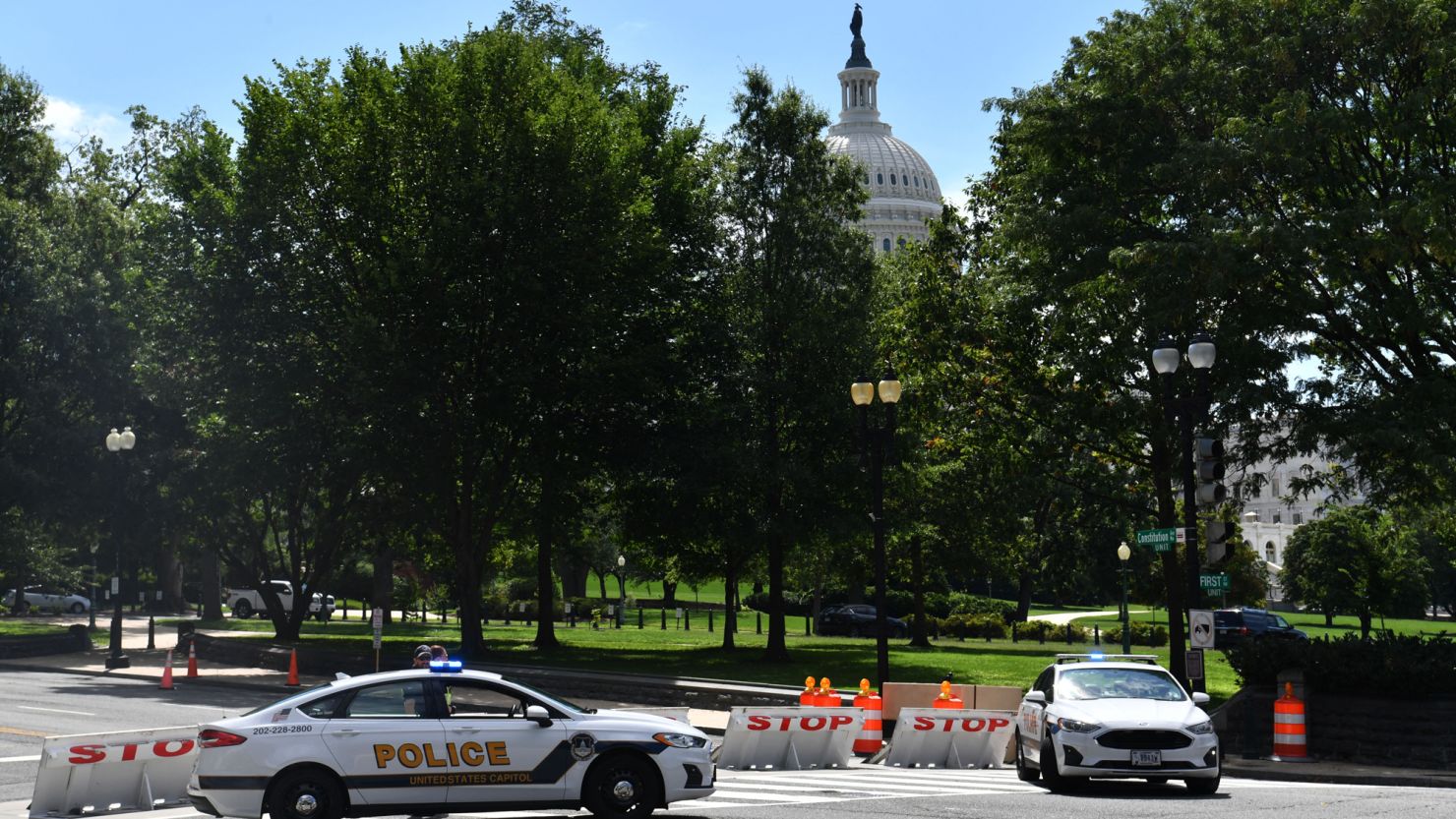 US Capitol police block a street during an investigation of a possible bomb threat near the US Capitol and Library of Congress in Washington, DC, on August 19, 2021.