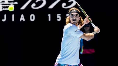 Tsitsipas hits a backhand against Khachanov in their semi-final match at the Australian Open.