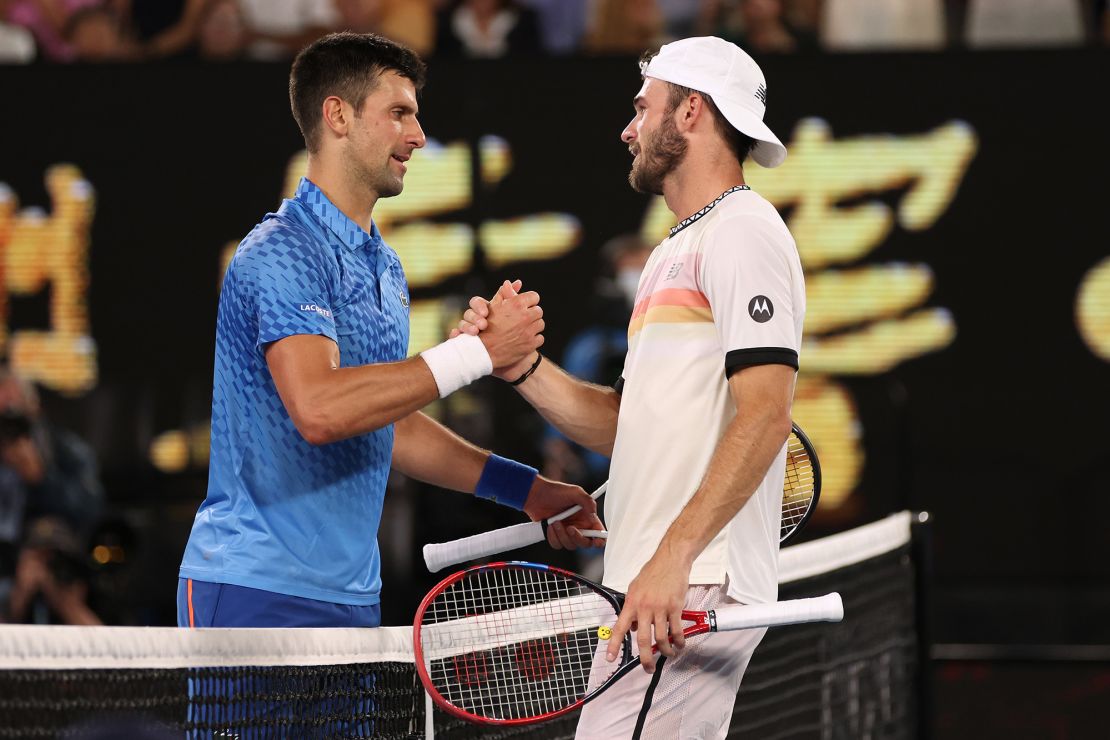 Djokovic and Paul embrace at the net after their Australian Open semifinal. 