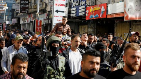 Mourning mourners attend the funeral of Palestinians killed in an Israeli raid in Jenin, in the occupied West Bank, on January 26, 2023.