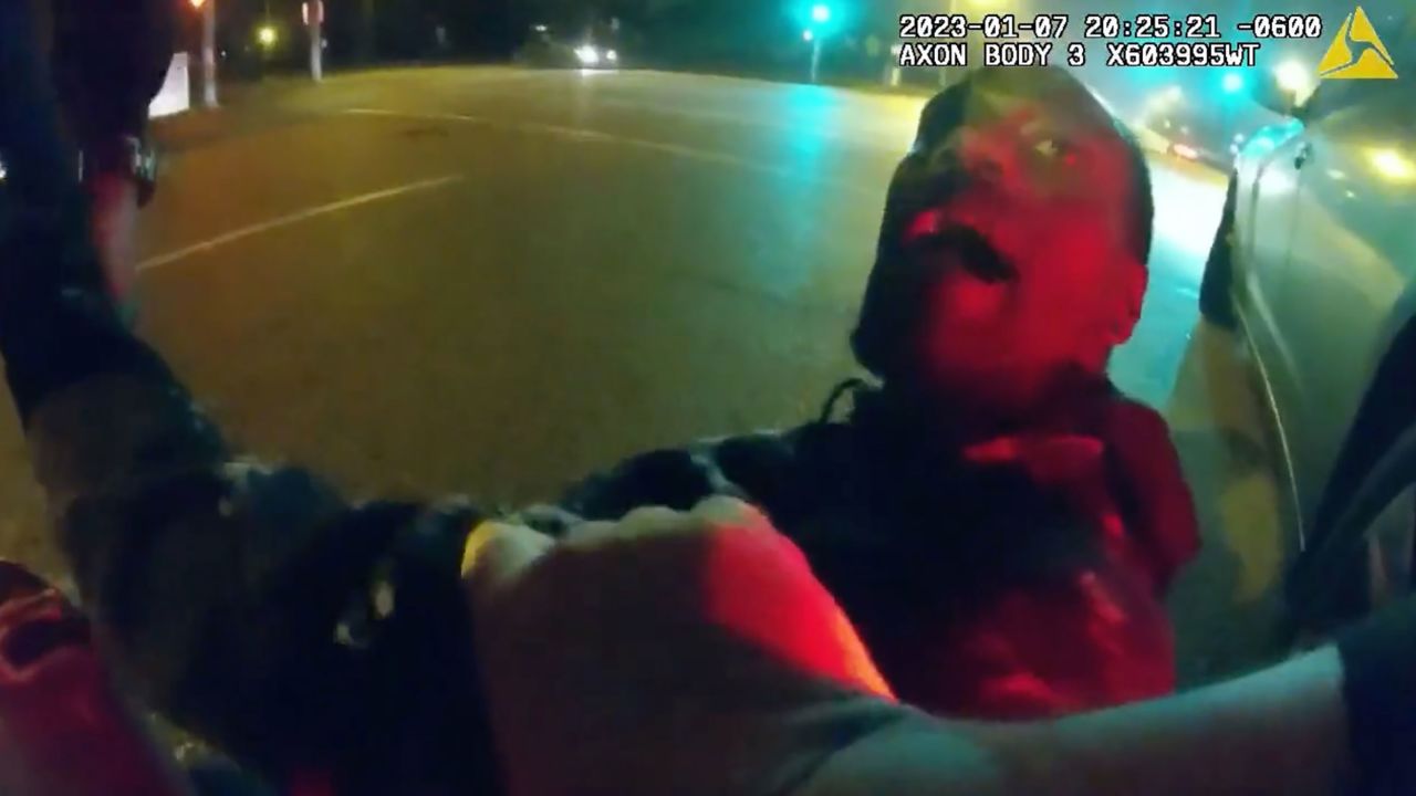 In this still image from a video released by the City of Memphis, officers attempt to arrest Tire Nichols during a traffic stop.