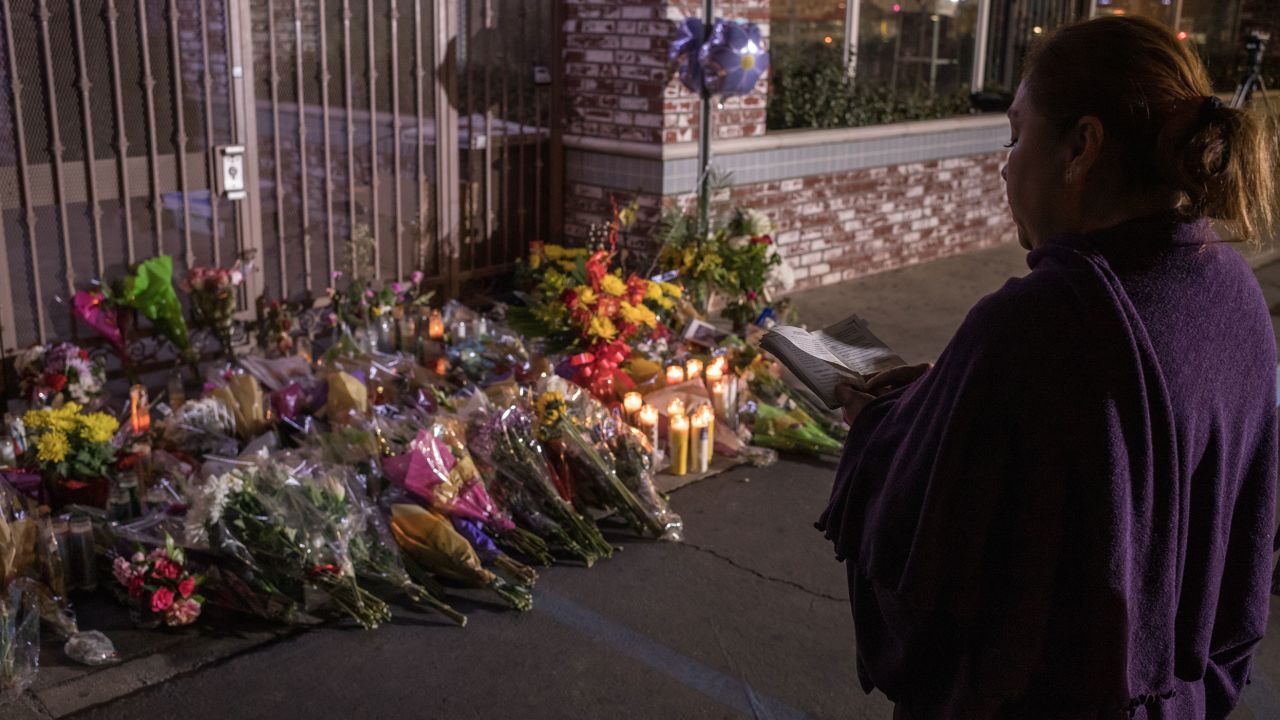 The gates outside the Star Ballroom Dance Studio have become surrounded by a makeshift memorial.