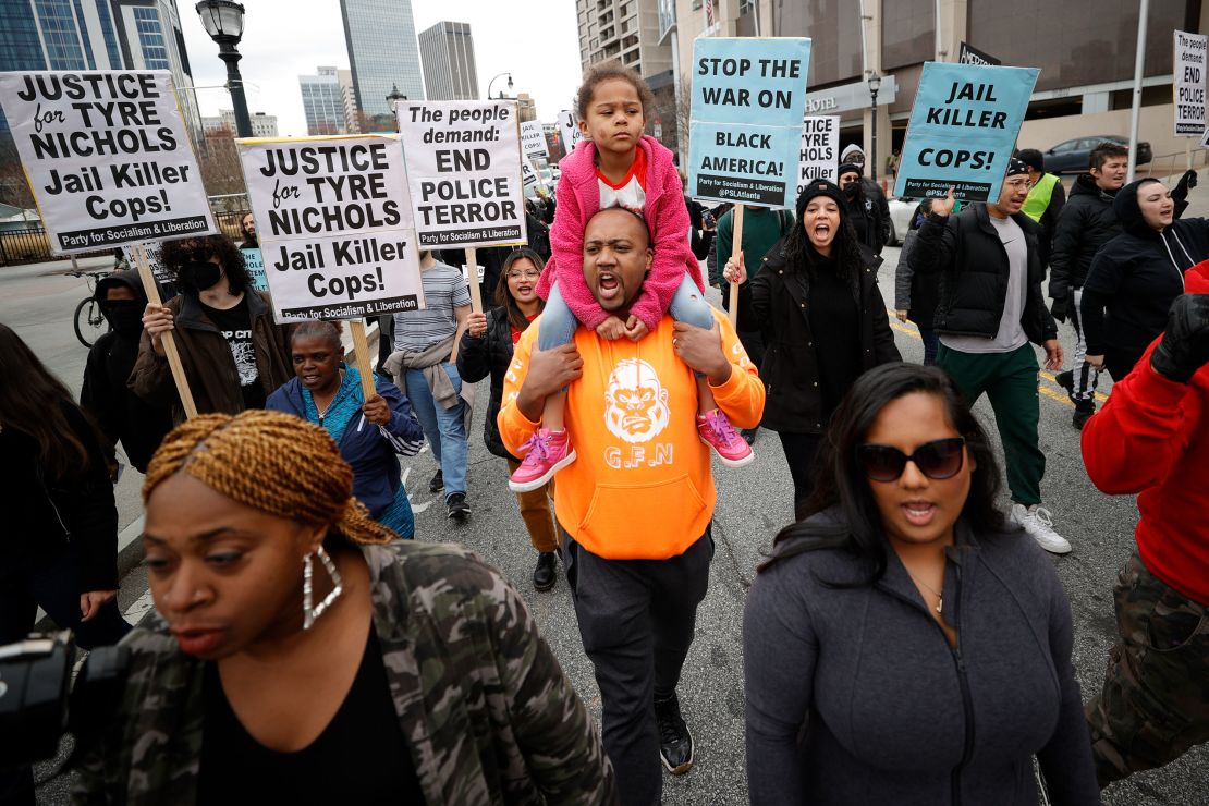 Demonstrators march during a protest, Saturday, Jan. 28, 2023, in Atlanta, over the death of Tyre Nichols, who died after being beaten by Memphis police. (AP Photo/Alex Slitz)