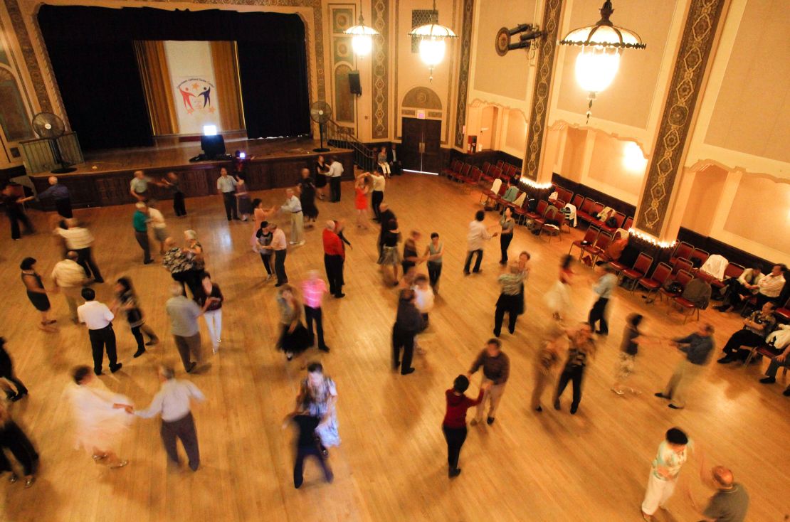 Ballroom dancers fill the floor at a senior center in Oakland, California.
