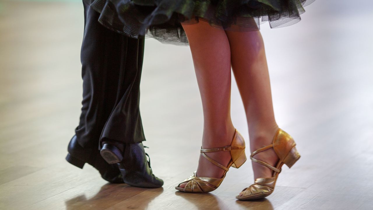 For many older Asians who take up ballroom dancing, differences fall away when the music starts.