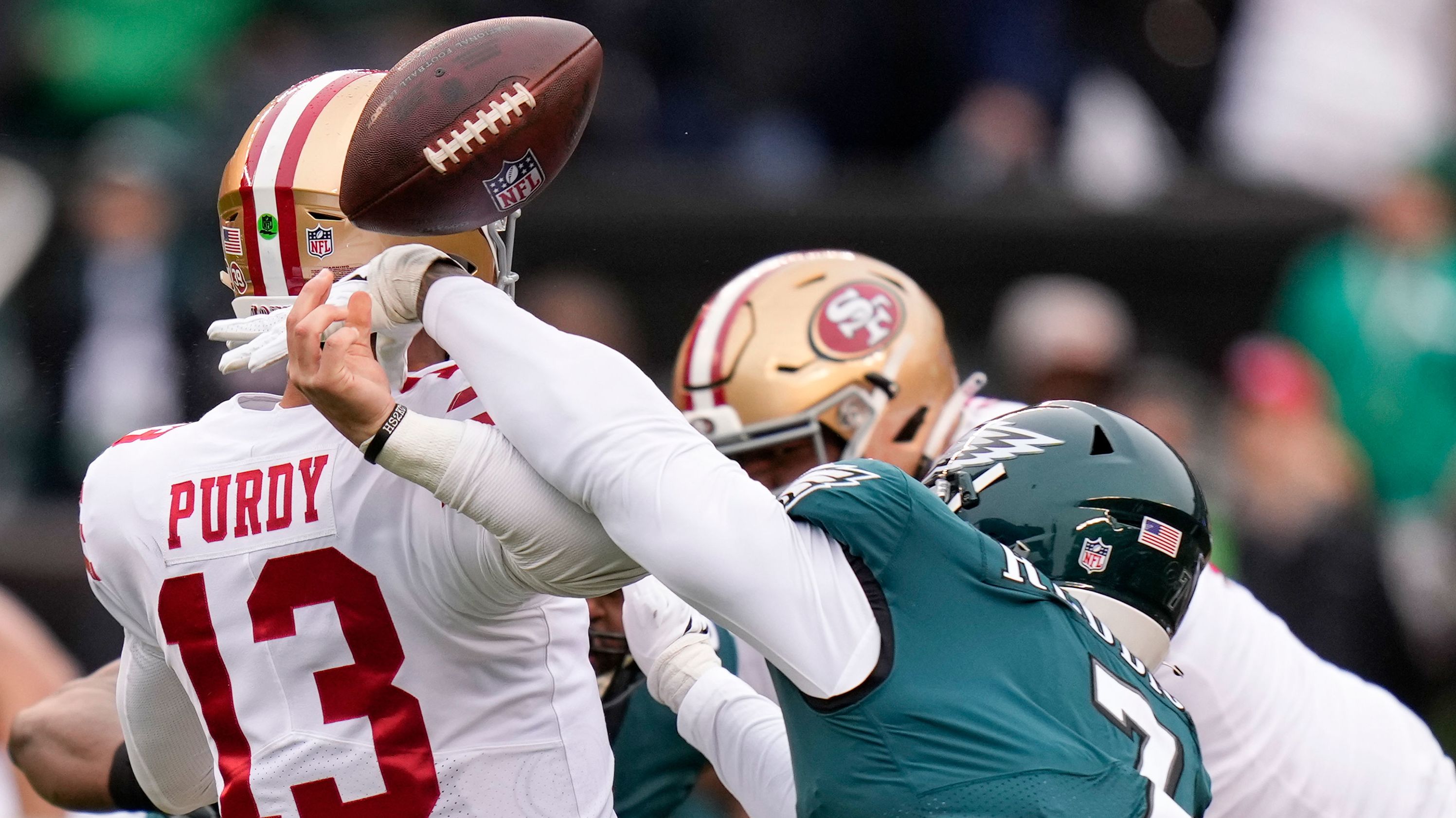 Philadelphia Eagles linebacker Haason Reddick causes San Francisco 49ers quarterback Brock Purdy to fumble during the NFC Championship. It was the Niners' first offensive drive and Purdy injured his elbow on the play. He left the game until the third quarter, when his backup Josh Johnson suffered a concussion. The Eagles won 31-7.