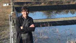 Evolutionary biologist Dolph Schluter is pictured at one of his ponds containing stickleback fish at the University of British Columbia.